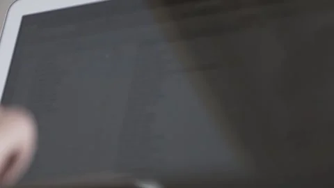 The guy in the office. The guy is working. The guy behind the phone and laptop Stock Footage 130731258