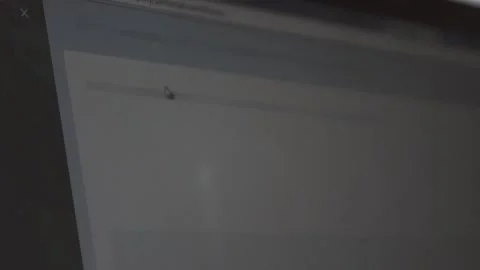 The guy in the office. The guy is working. The guy behind the phone and laptop Stock Footage 130731284