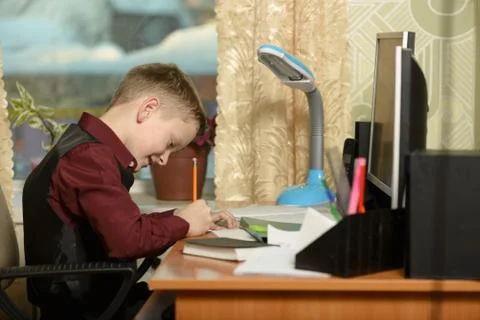 The guy at the office uses computer technology Stock Photos