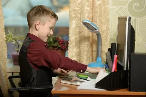 The guy at the office uses computer technology Foto stock