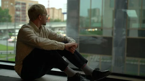 Guy at the office window Stock Footage 131511328