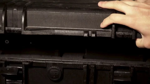 Guy opening flight case filled with Tablets  Video stock 104082358