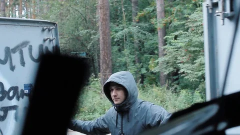 The guy opens the garage door with a key and goes inside Stock Footage 113859281