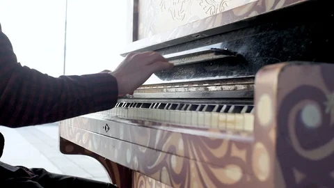 Guy opens the piano lid Stock Footage 93663932