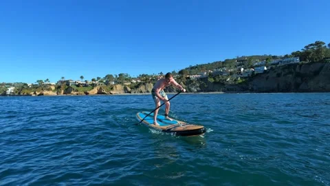 Guy Paddleboarding Stock Footage 170801271