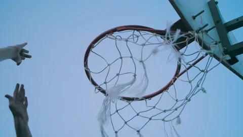 Guy in the park throws a basketball into the basket Stock Footage 245270385