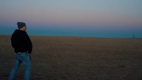 Guy pees in the mountains Stock Footage 98451017