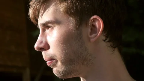 Guy periodically looks away Video stock 103650110