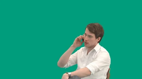 Guy on the phone - green screen - pre keyed - MINT.GS Stock-Footage 8647067