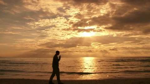 Guy phone sunset Stock Footage 20510256