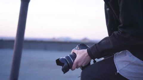 The guy is a photographer. Stock Footage 107860682