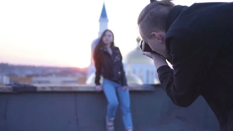 The guy is a photographer. Stock Footage 107860704