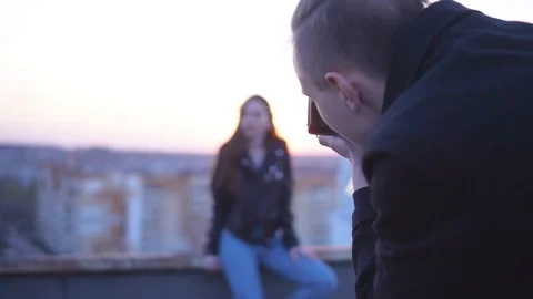 The guy is a photographer. Stock Footage 107860710