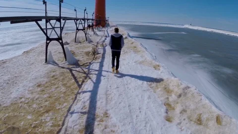 Guy On Pier In Winter Stock Footage 88675942
