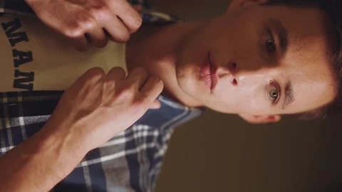 Guy in a plaid shirt posing, guy model in slow motion Stock Footage 254730016