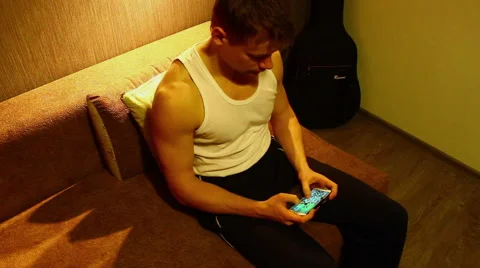 Guy play into phone game. HD Video stock 48250527