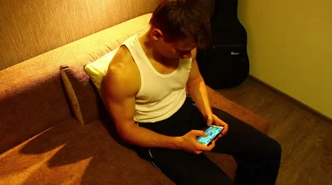 Guy play into phone game. HD Stock Footage 48250595