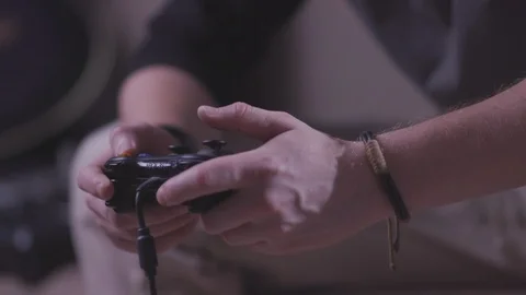 The guy is playing a computer game Stock Footage 118857801