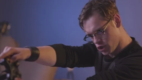 The guy is playing a computer game Stock Footage 118857839