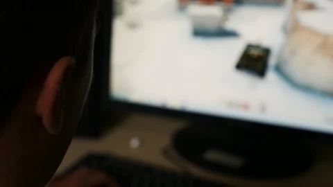 The guy playing computer games Stock Footage 89257510