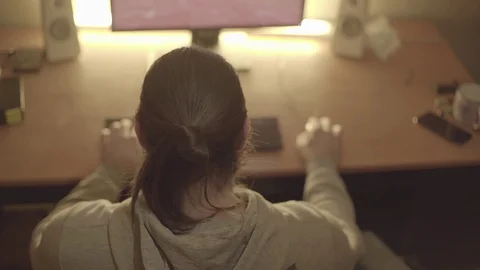 Guy playing computer games, tired eyes from stress Stock Footage 129521775