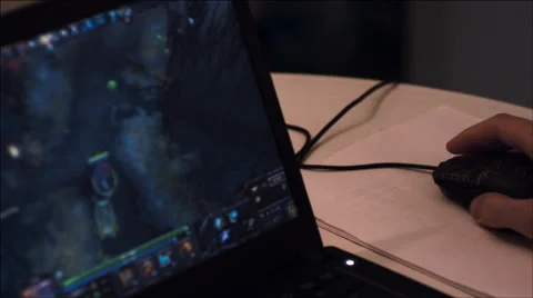 A guy playing at the computer at night. Stock Footage 37539121