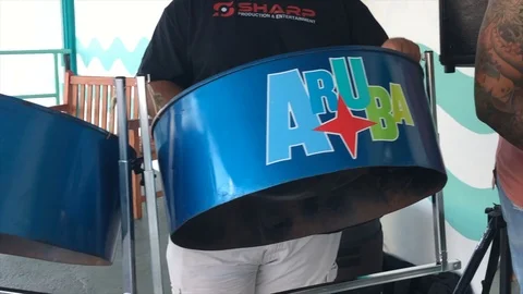Guy playing drums in Aruba Stock Footage 102798531