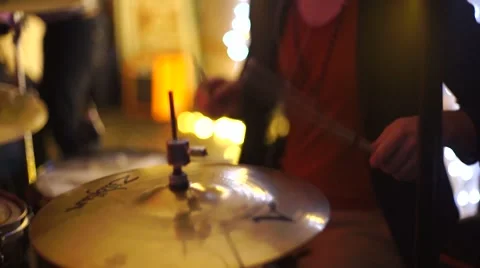 Guy playing the drums at the party Stock Footage 55789079