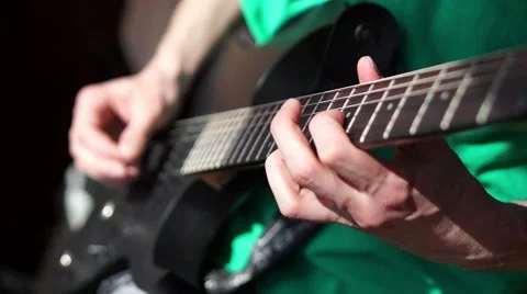 A guy playing electric guitar Stock Footage 61817592