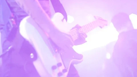 The guy playing the electric guitar.Close-up Stock Footage 75913116