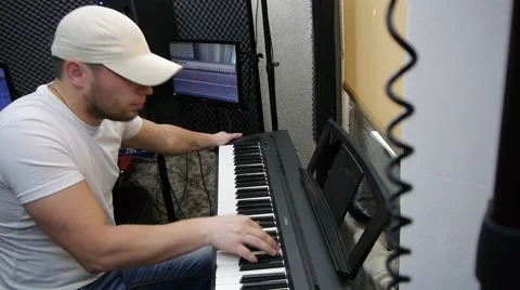 The guy playing the electric piano. Stock Footage 64274653