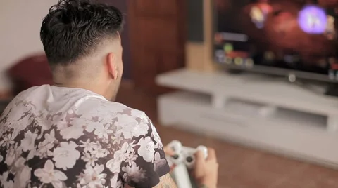 Guy playing game Stock Footage 50795268