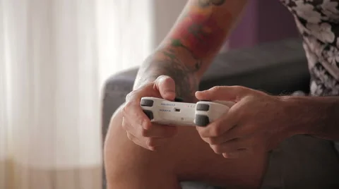 Guy playing game Video stock 50804878