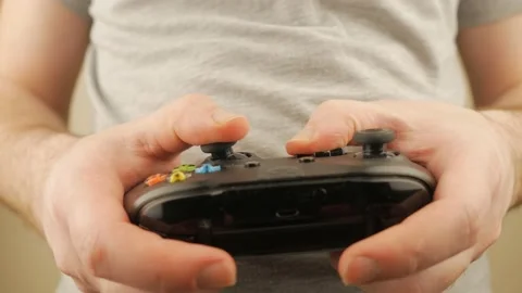 A Guy Playing A Game On A Joystick Stock-Footage 151218925