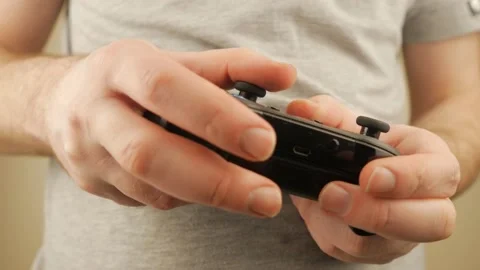 A Guy Playing A Game On A Joystick Stock Footage 151218931