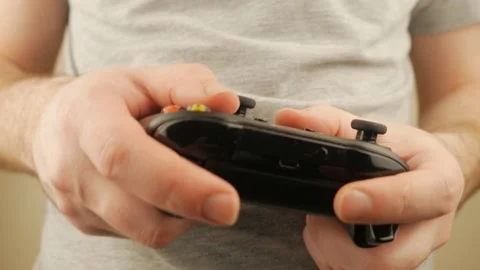 A Guy Playing A Game On A Joystick Stock Footage 151218936