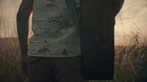 Guy Playing Guitar in a Field of Wheat 스톡 동영상 72084719