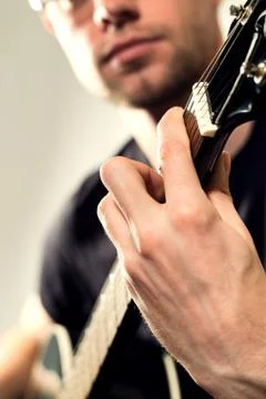 Guy playing guitar Stock Photos