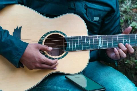 Guy playing guitar Stock Photos