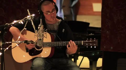 Guy playing guitar Recording Studio 16 Stock Footage 8846320