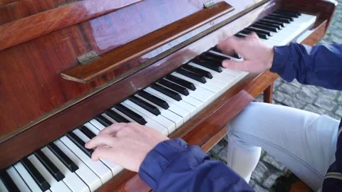 Guy playing the piano.Close-up Shot Stock Footage 163350346