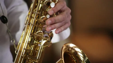 The guy playing the saxophone gold Stock Footage 48169097