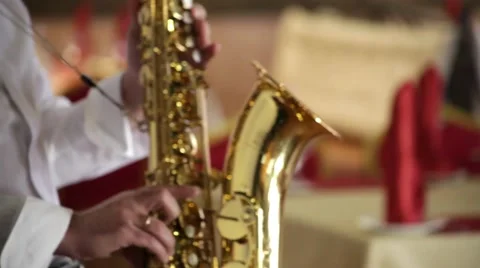 The guy playing the saxophone gold Stock Footage 48169111