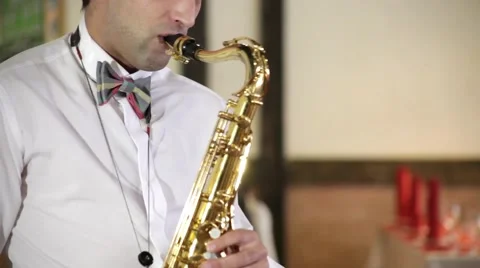 The guy playing the saxophone gold Stock Footage 48169249