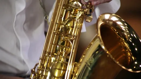 The guy playing the saxophone gold Stock Footage 48169292