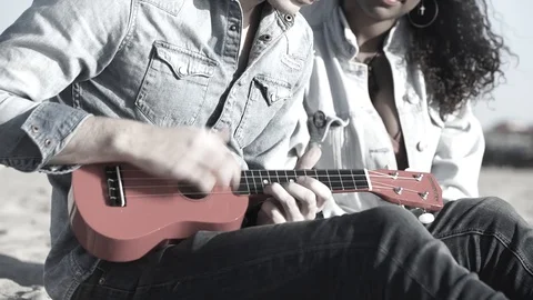 Guy Playing Ukulele Stock Footage 129861081