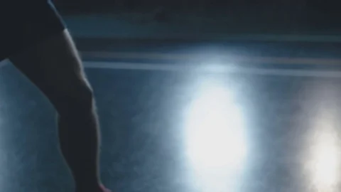 Guy playing volleyball in a huge hall Stock Footage 76600909