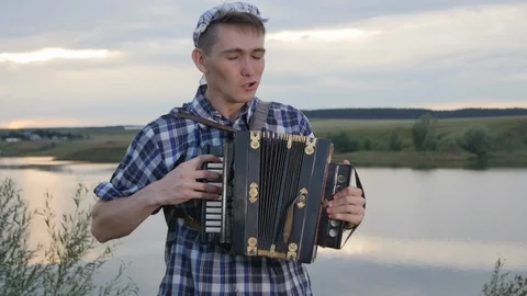 Guy Plays the Accordion Like Crazy Stock Footage 87590931