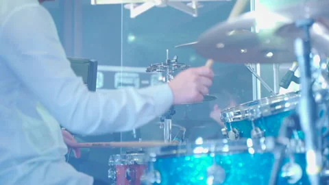 Guy plays the drums on the concert Stock-Footage 149600583