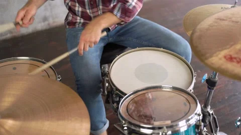 The guy plays the drums. Drum sticks banging a basic Stock Footage 155554120
